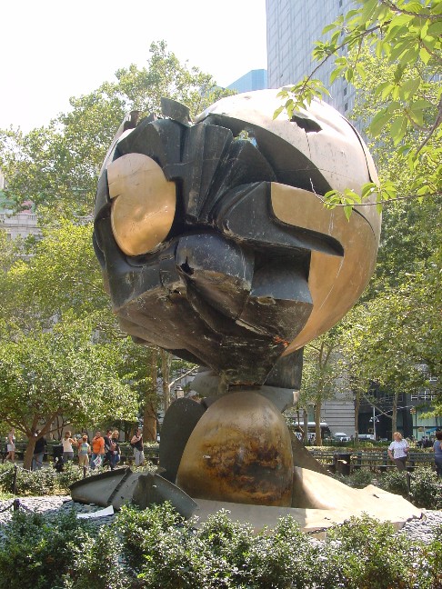 The damaged “Sphere” sculpture after being dug out of ground zero. here is it on display in battery Park.